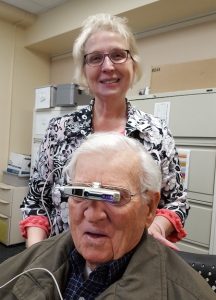 doctor with patient getting low vision glasses