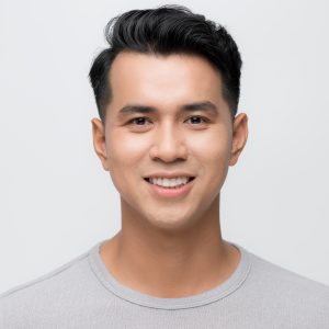 young asian man close up smile