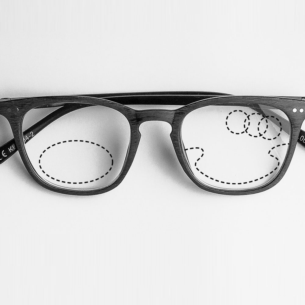 two pairs of glasses on a table