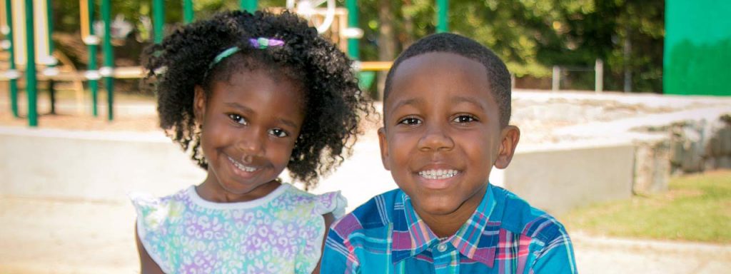 Cute Children Smiling in the Playground in Brampton, Ontario