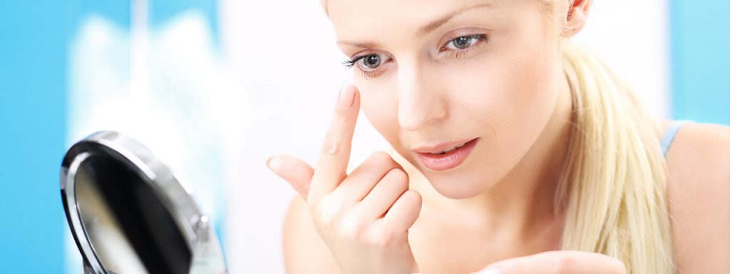 Girl Putting in Contact lens 1280x480