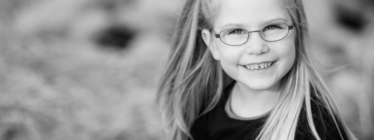 Young Girl Smiling Glasses 1280x480