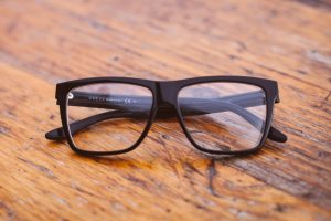 Eye doctor, pair of glasses on wood in Kissimmee & Lakeland, FL