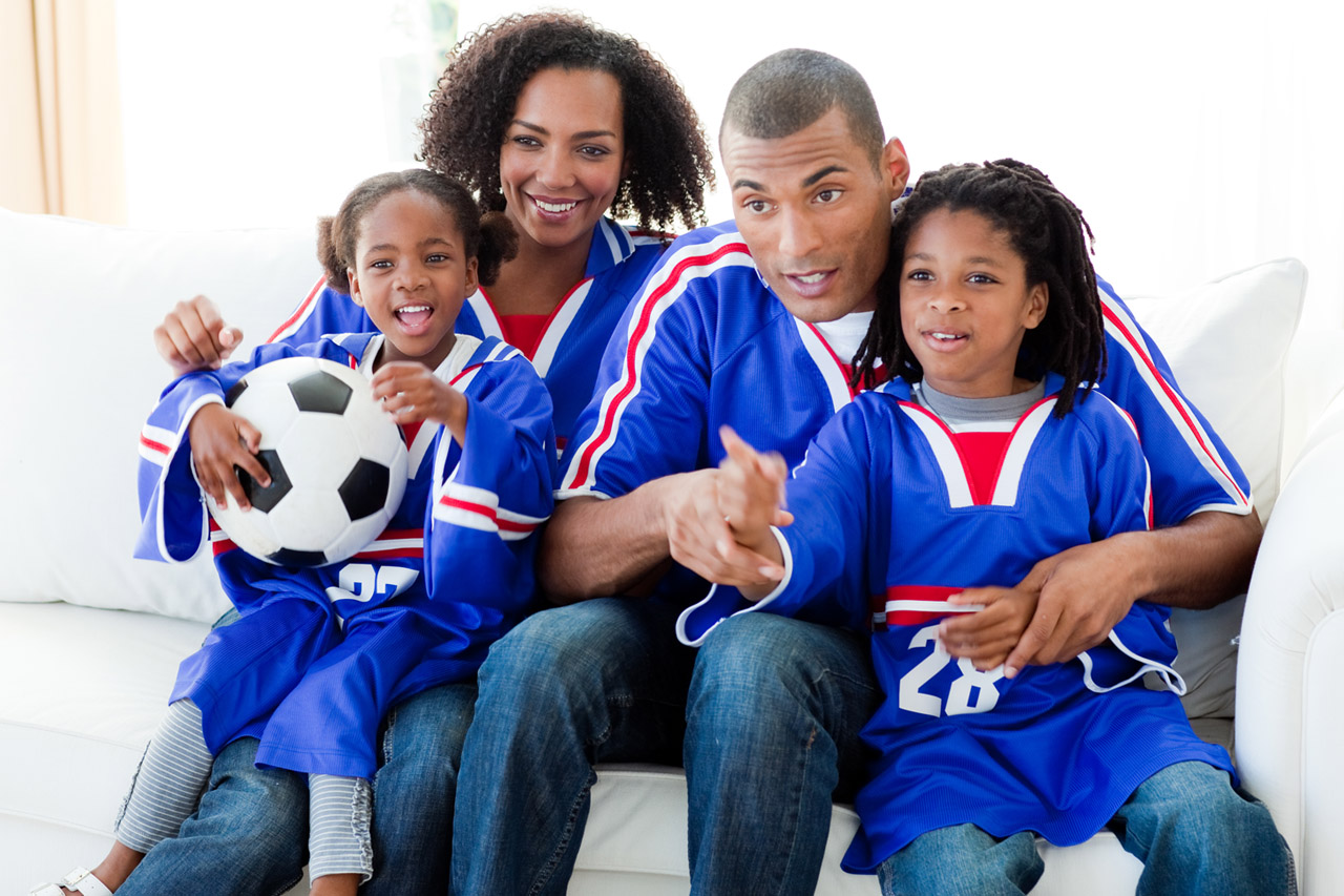Happy Family Watching Sports 1280x853
