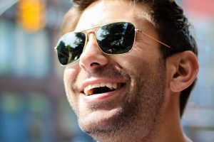 Man Smiling Sunglasses 1280x853