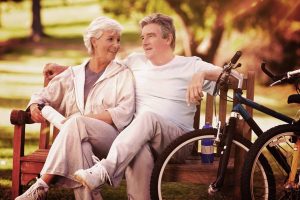 Eye Doctor, older couple on park bench in Colorado Springs, CO