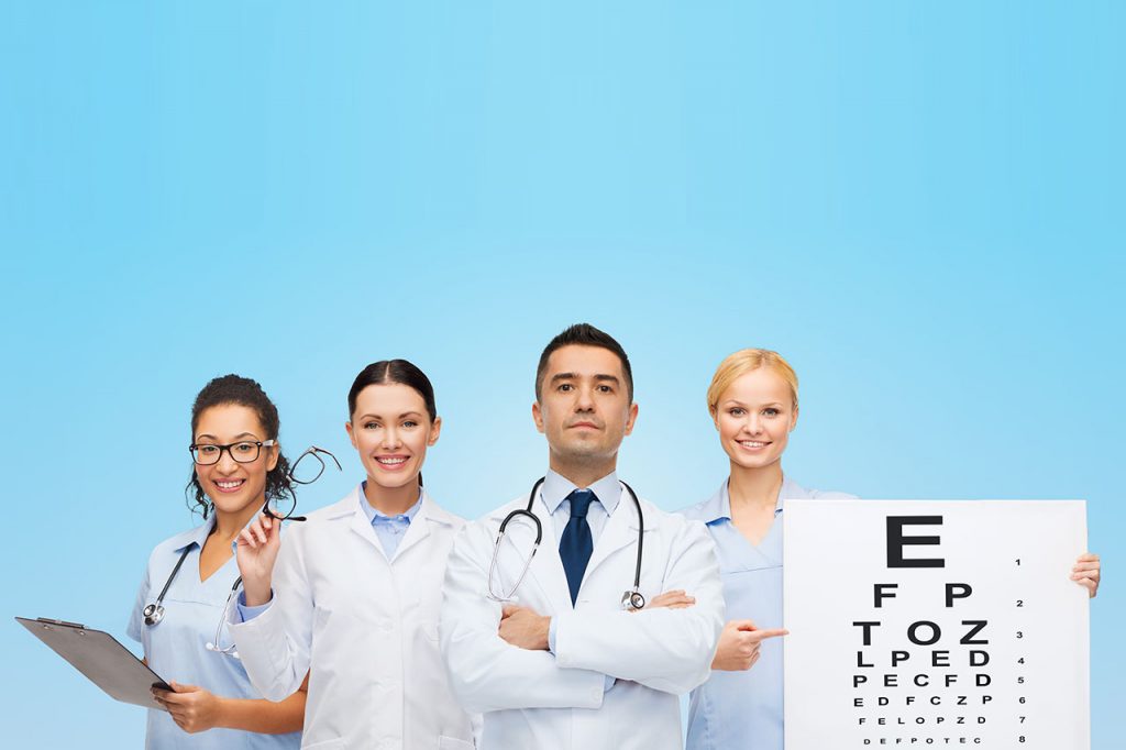 group of doctors with eye chart and glasses