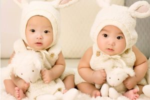 Asian babies dressed as bunnies | River Oaks Family Optometry