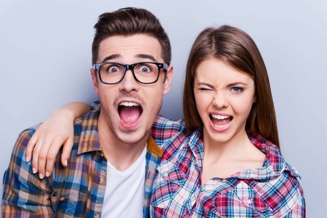 Man wearing glasses, with girlfriend