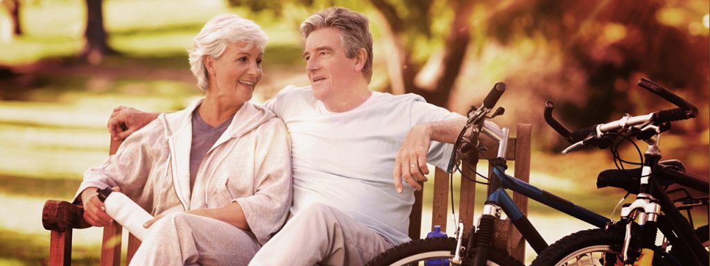 Older Couple On Bench With Bikes, Optometrist, Eye Exam, Providence, RI