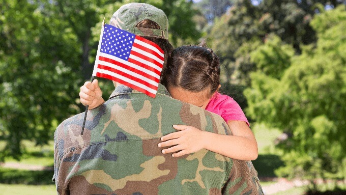 Mother soldier and child hugging in Fayetteville, NC