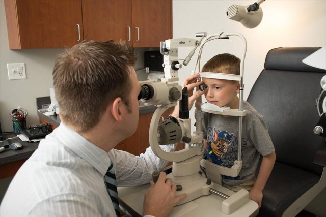 Eye Doctor, little boy in eye exam in Hoffman Estates, IL