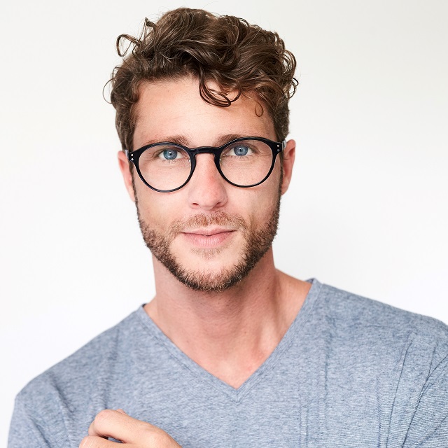 trendy young man beard eyeglasses