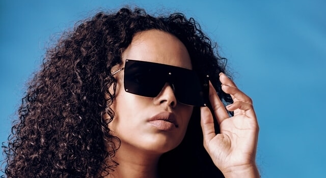 woman wearing protective shield sunglasses 640