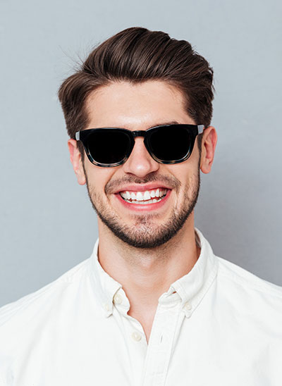 man with sunglasses smiling