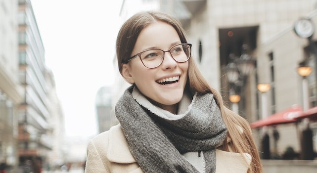happy woman wearing eyeglasses in winter.jpg
