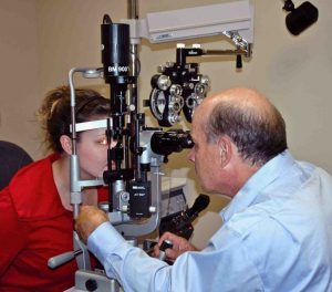 dr vaughan performing a medical eye exam