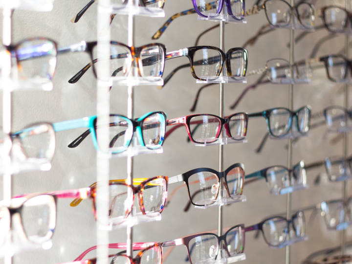 wall of eyeglasses with your optician 720×540