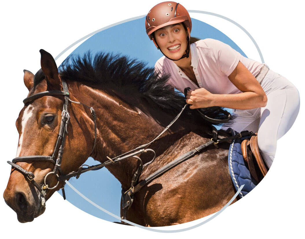 woman riding a horse and smiling with wide eyes2