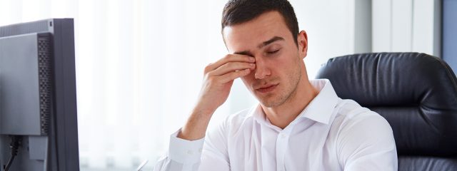 Man suffering from dry eyes