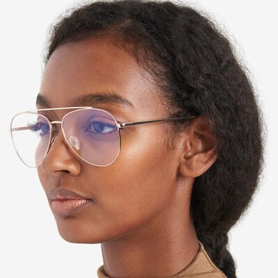 african american woman wearing kenneth cole aviator eyeglasses