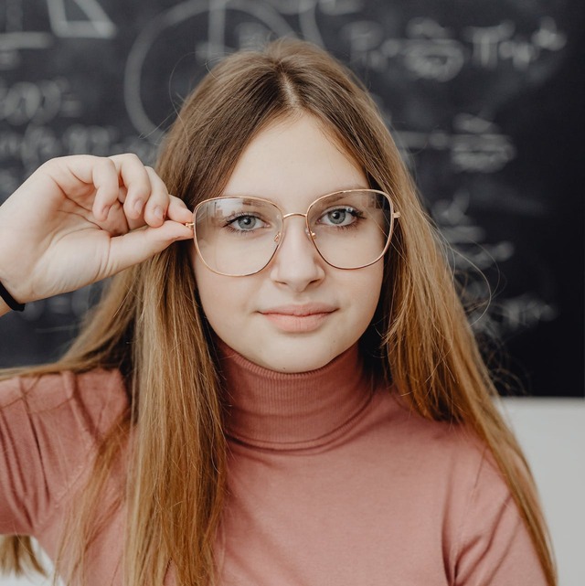 young girl wearing eyeglasses