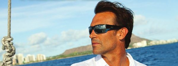 Eye doctor, man wearing Maui Jim sunglasse sin Lantana, FL