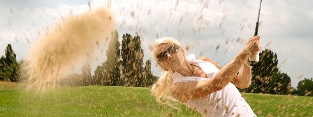 Eye care, woman playing golf in Providence, RI