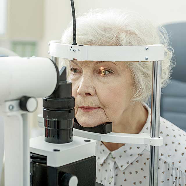 senior woman eye exam 6401