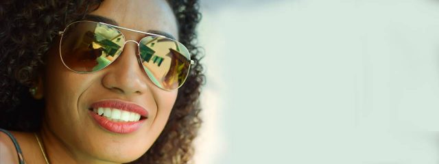 Eye care, woman wearing sunglasses in Irving, TX, 