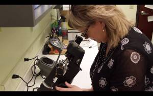 Eye doctor, Dr. is working with instrument in Fuquay Varina, NC 