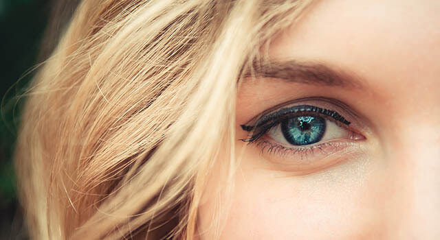 Close up of woman with blue eyes
