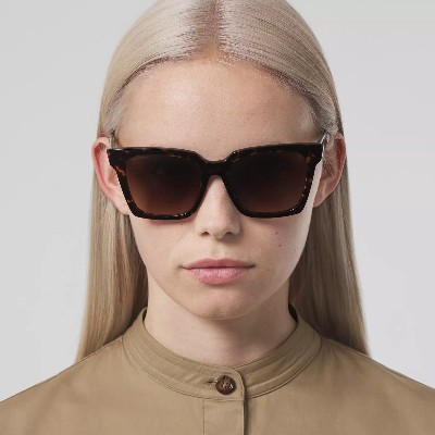 woman wearing burberry sunglasses