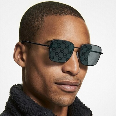african american man wearing dark michael kors sunglasses