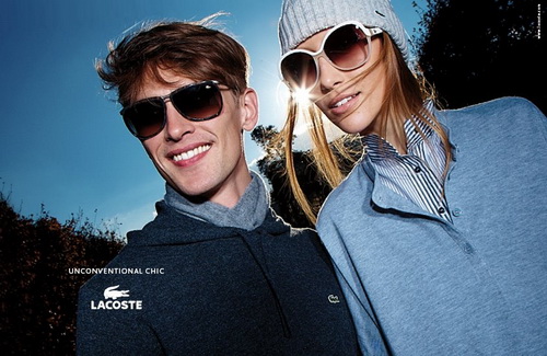 Woman and man wearing sunglasses, Lacoste