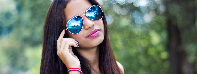 Girl Wearing Blue Tinted Sunglasses 800×300