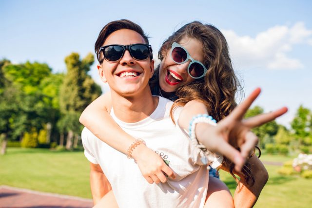young couple wearing sunglasses