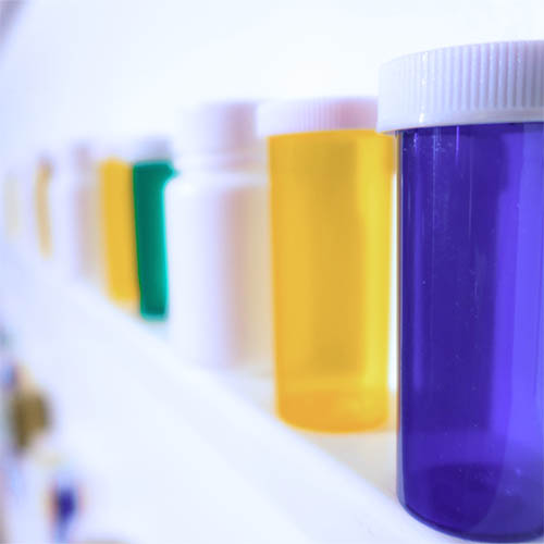 Medicine bottles on a shelf, Optometrist in Orlando & Lake Mary, FL