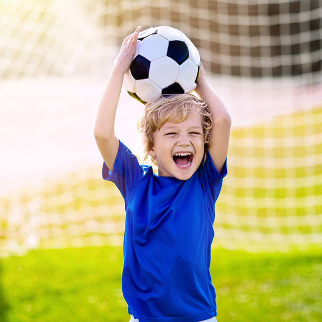 child playing sport vision therapy