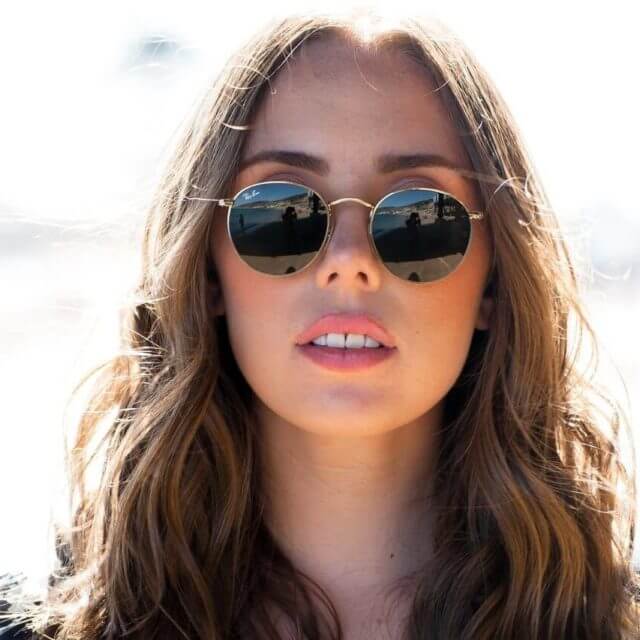 woman wearing designer sunglasses in Northwest Houston, Texas 