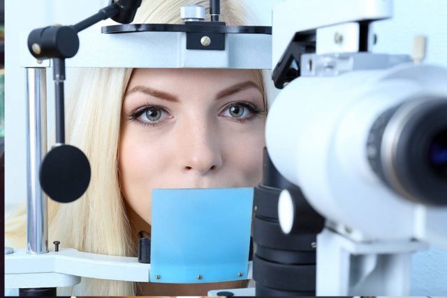 Eye doctor, woman at an eye exam in Los Osos, CA