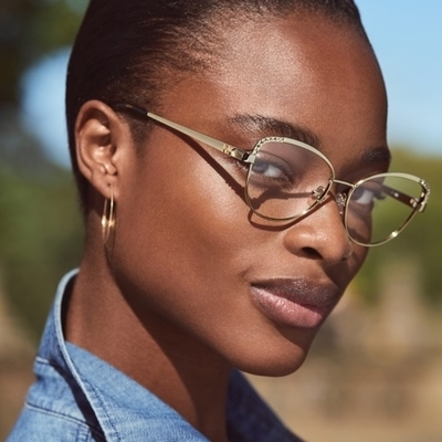 woman wearing michael kors eyeglasses