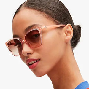young woman wearing kate spade sunglasses