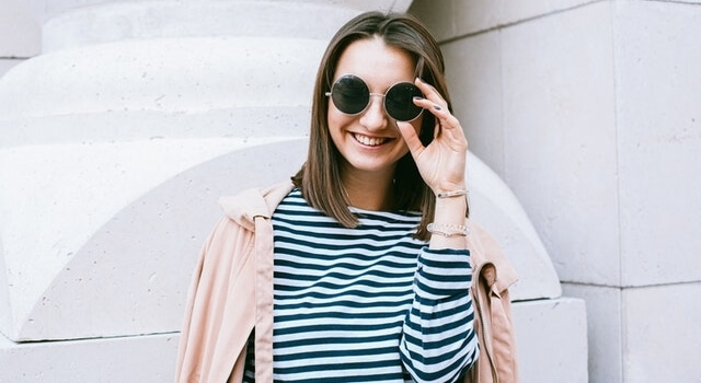 young woman wearing round sunglasses 640.jpg