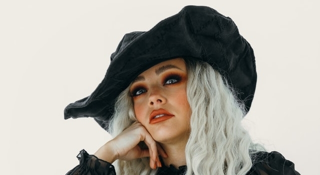 woman wearing a witch costume 640×350 1.jpg