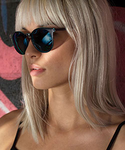 Model wearing Dragon sunglasses