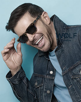 Guy in Demin Jasket Wearing Wolf Sunglasses