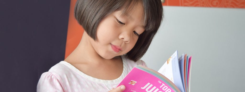 Asian-Girl-Reading-Book-1280x480-1024x384