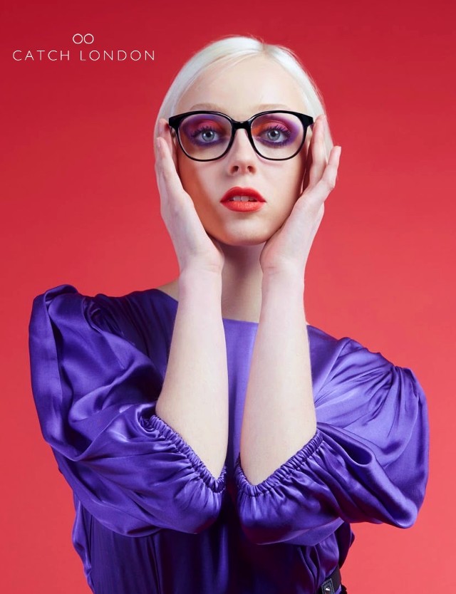woman wearing purple catch london eyeglasses