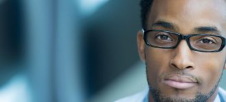 African-American man wearing eyeglasses